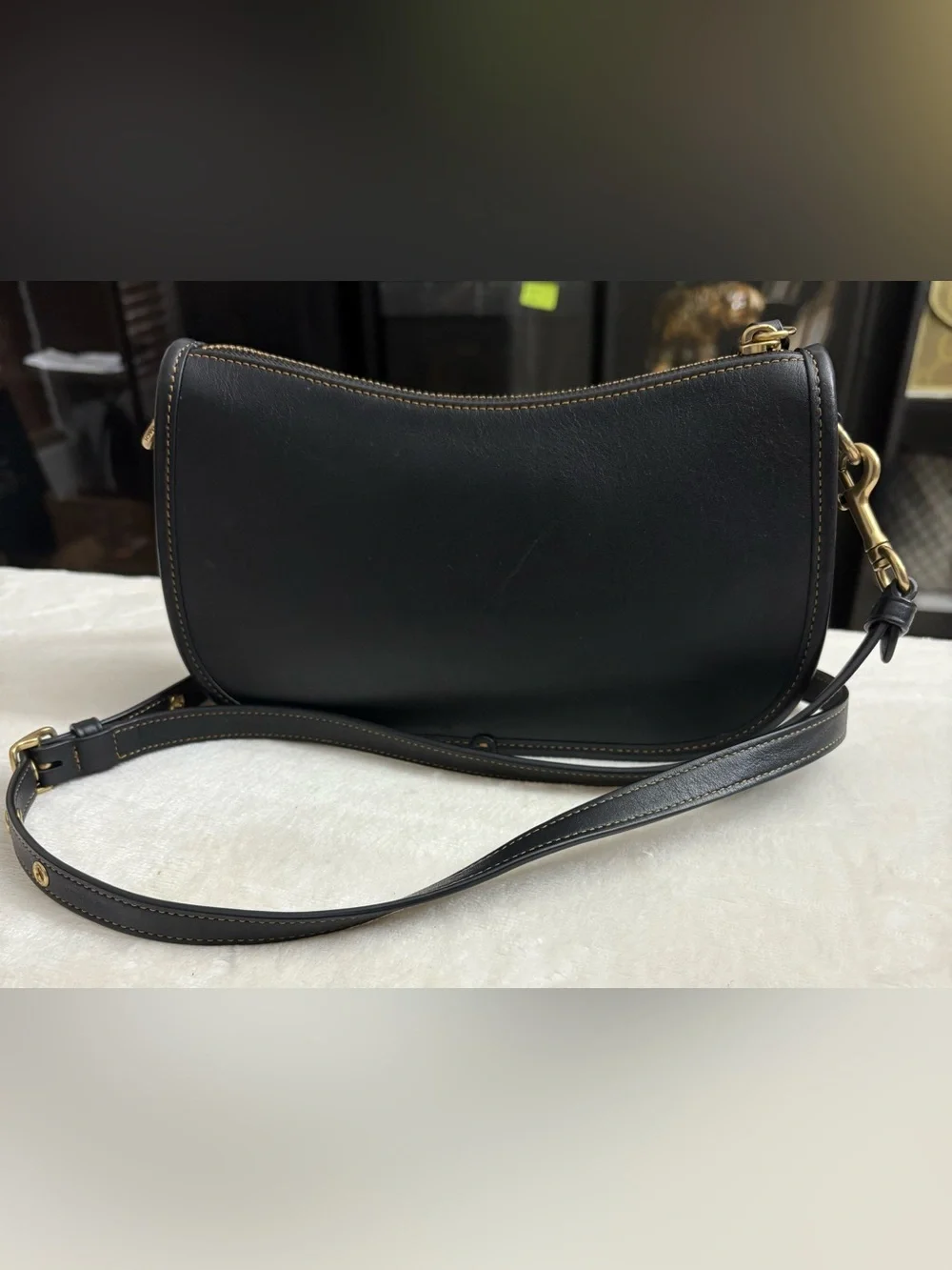 Coach Black Swinger Glove-Tanned Leather Crossbody Bag.
